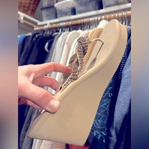 Wedge foam sandals with faux crystal flip flop style